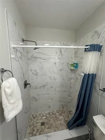 a en suite bathroom with a sink and a mirror