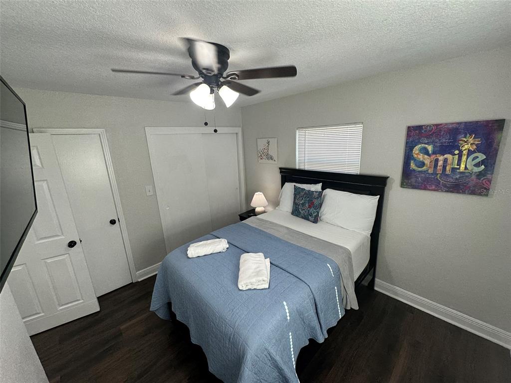 16903 Hanna Road Lutz, FL 33549 - Photo 50 of 94 a bedroom with a bed and a window