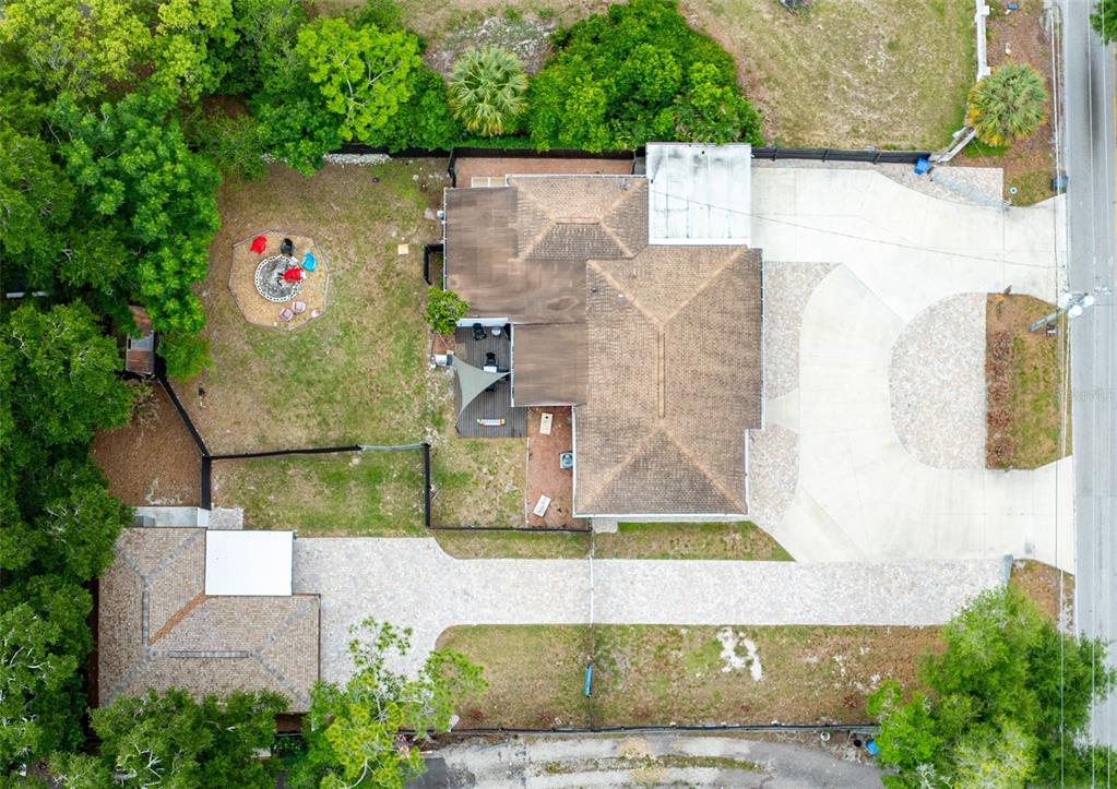 16903 Hanna Road Lutz, FL 33549 - Photo 7 of 94 an aerial view of a house with a yard