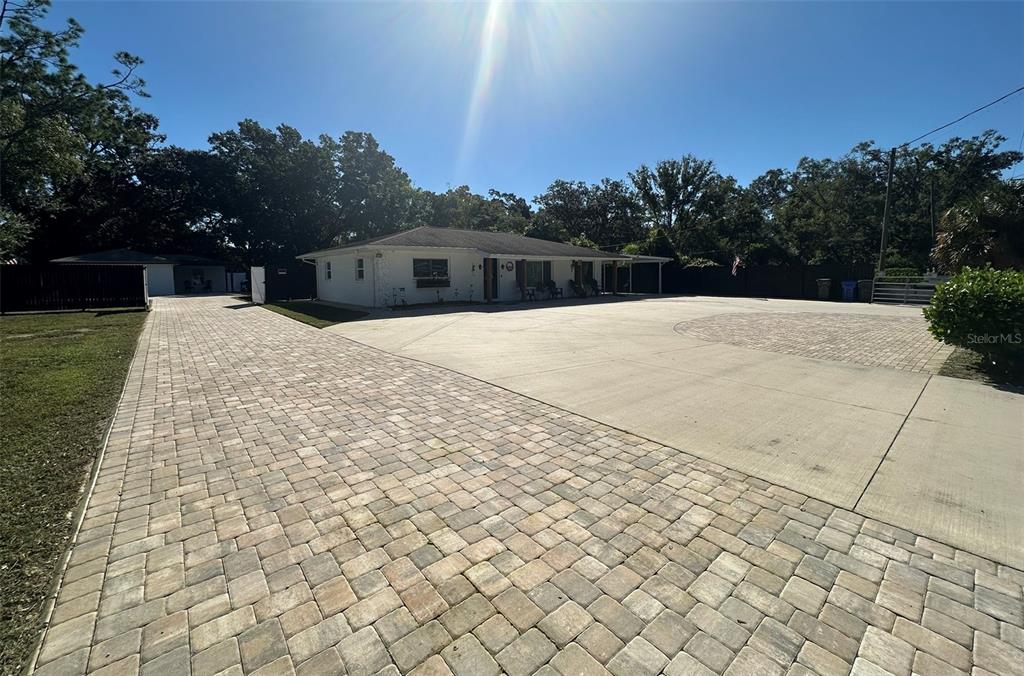 16903 Hanna Road Lutz, FL 33549 - Photo 8 of 94 a view of a backyard of the house