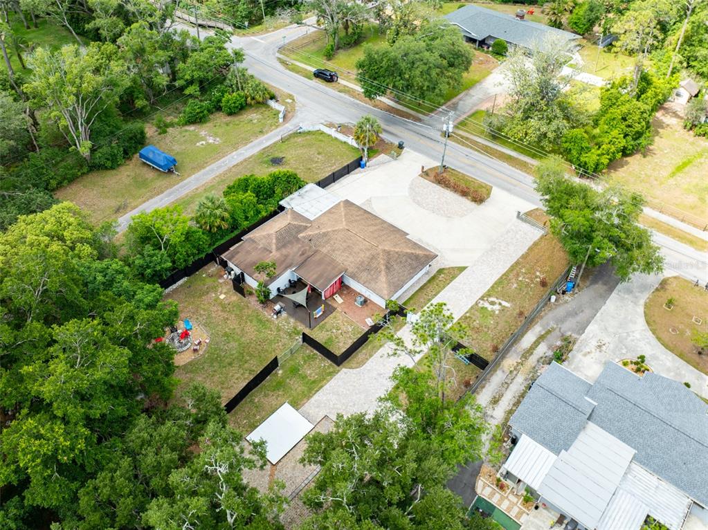 16903 Hanna Road Lutz, FL 33549 - Photo 93 of 94 an aerial view of a house with a yard