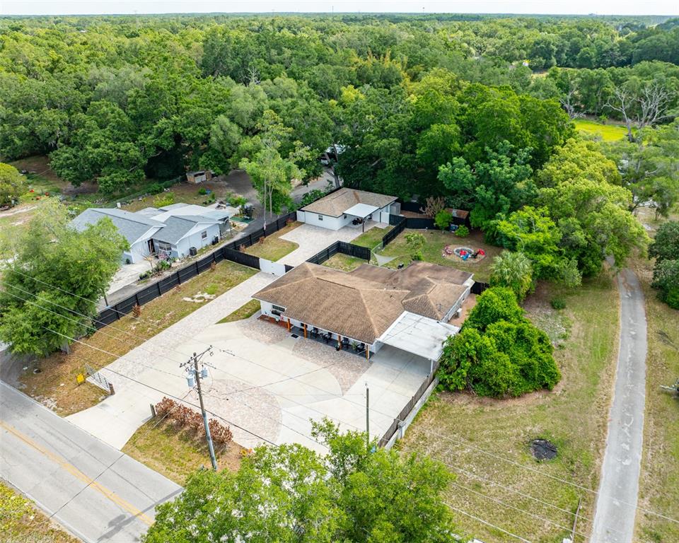 16903 Hanna Road Lutz, FL 33549 - Photo 10 of 94 a view of a street with a houses