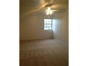 2401 Leon Street, Unit 305 Austin, TX 78705 - Photo 9 of 13 a view of an empty room with a window