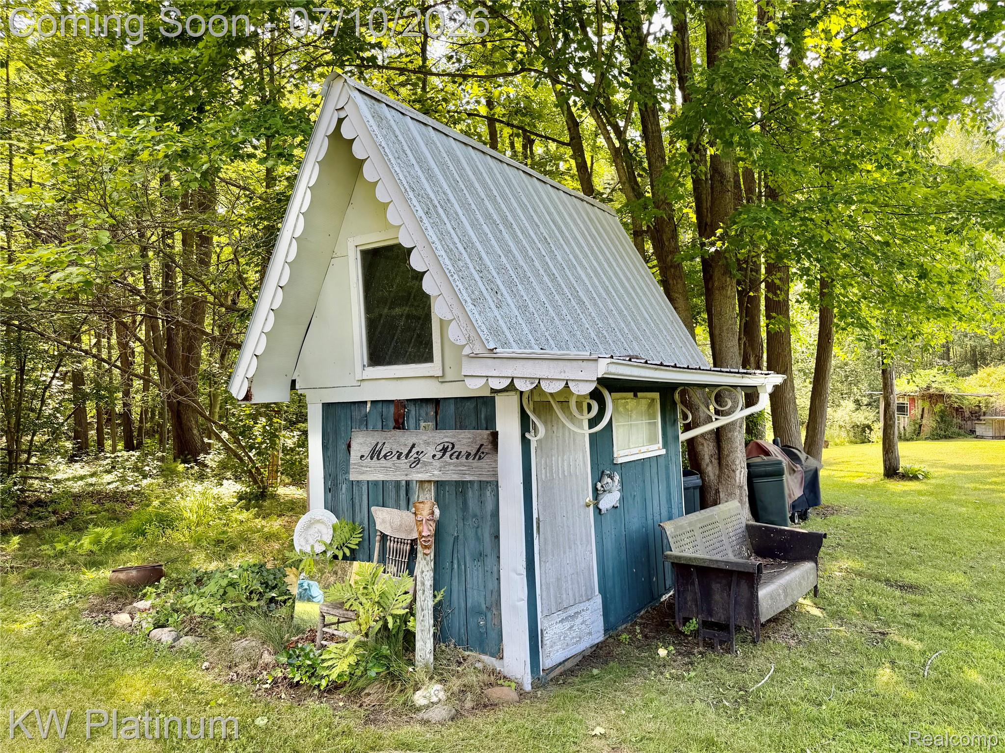1581 Emerson Road Goodells, MI 48027 - Photo 31 of 45 Compact outbuilding featuring a metal roof and light blue siding