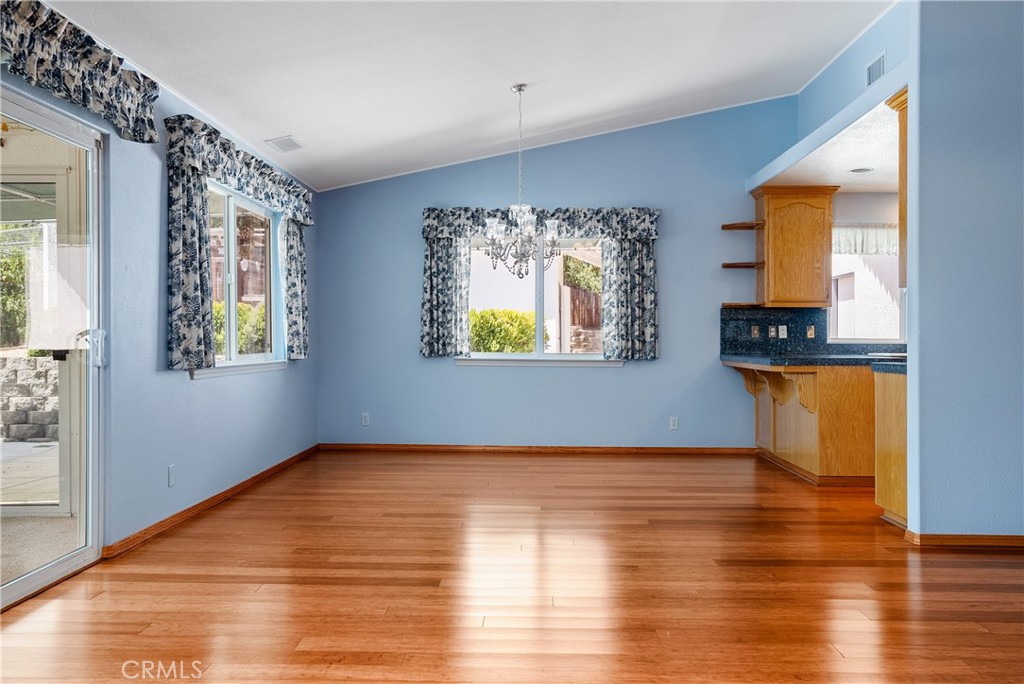 9340 Mountain View Drive Atascadero, CA 93422 - Photo 48 of 50 a view of an empty room with wooden floor and a window