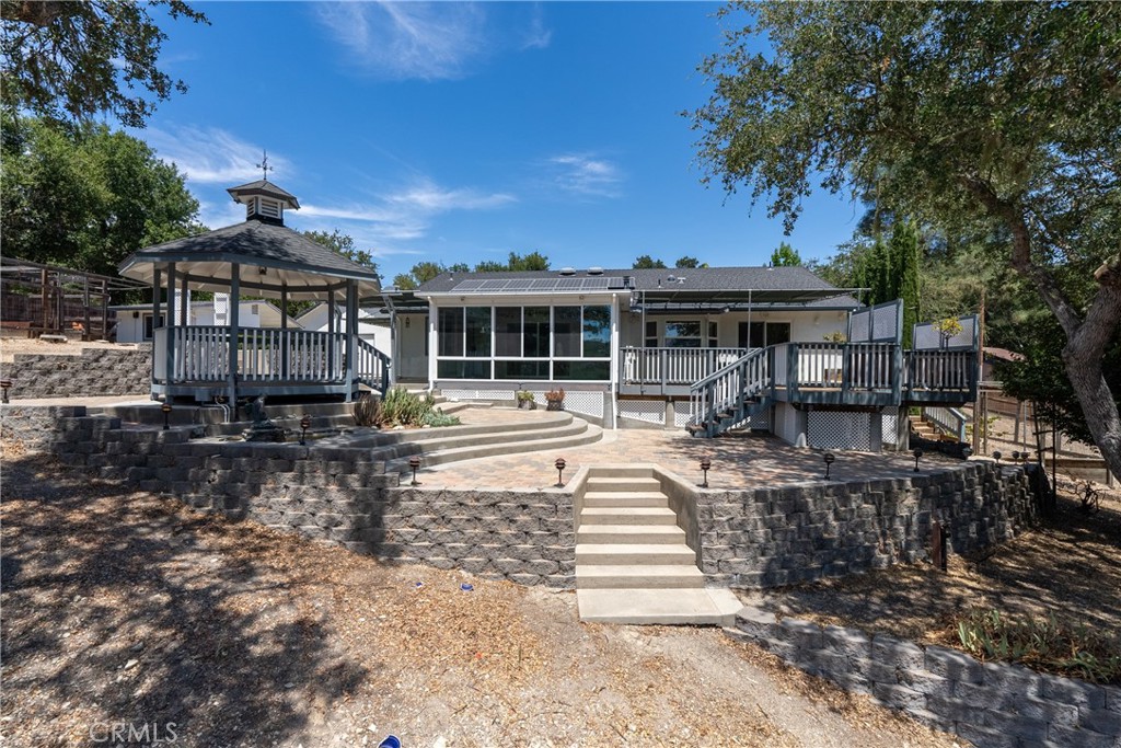 9340 Mountain View Drive Atascadero, CA 93422 - Photo 30 of 50 a front view of a house with a yard