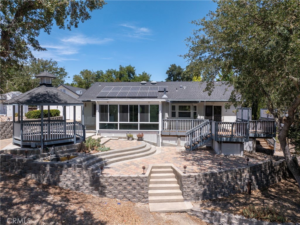 9340 Mountain View Drive Atascadero, CA 93422 - Photo 31 of 50 a front view of a house with garden