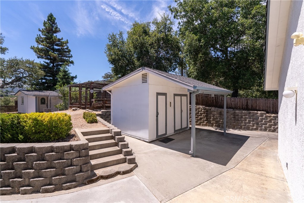 9340 Mountain View Drive Atascadero, CA 93422 - Photo 39 of 50 a view of a house with wooden fence