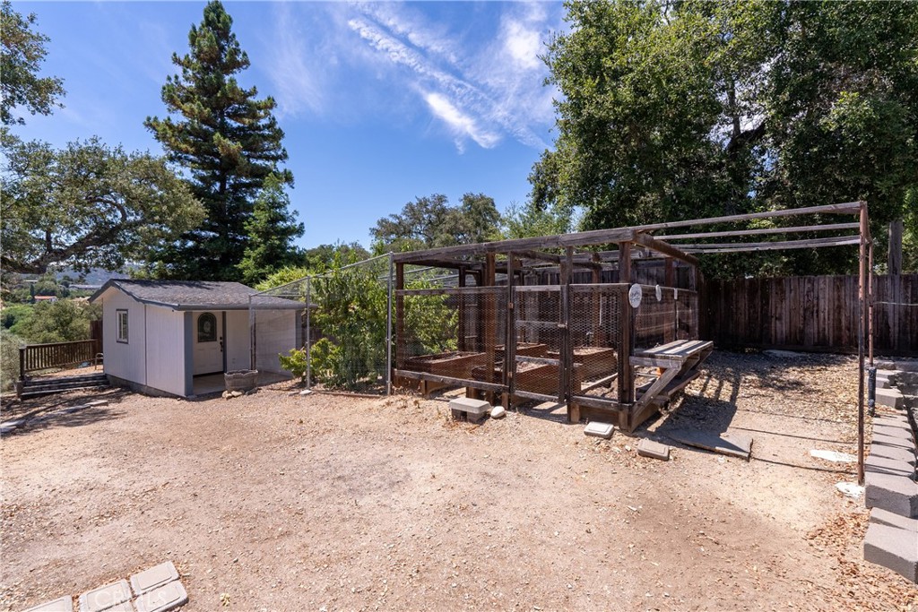 9340 Mountain View Drive Atascadero, CA 93422 - Photo 41 of 50 a view of a house with backyard and sitting area
