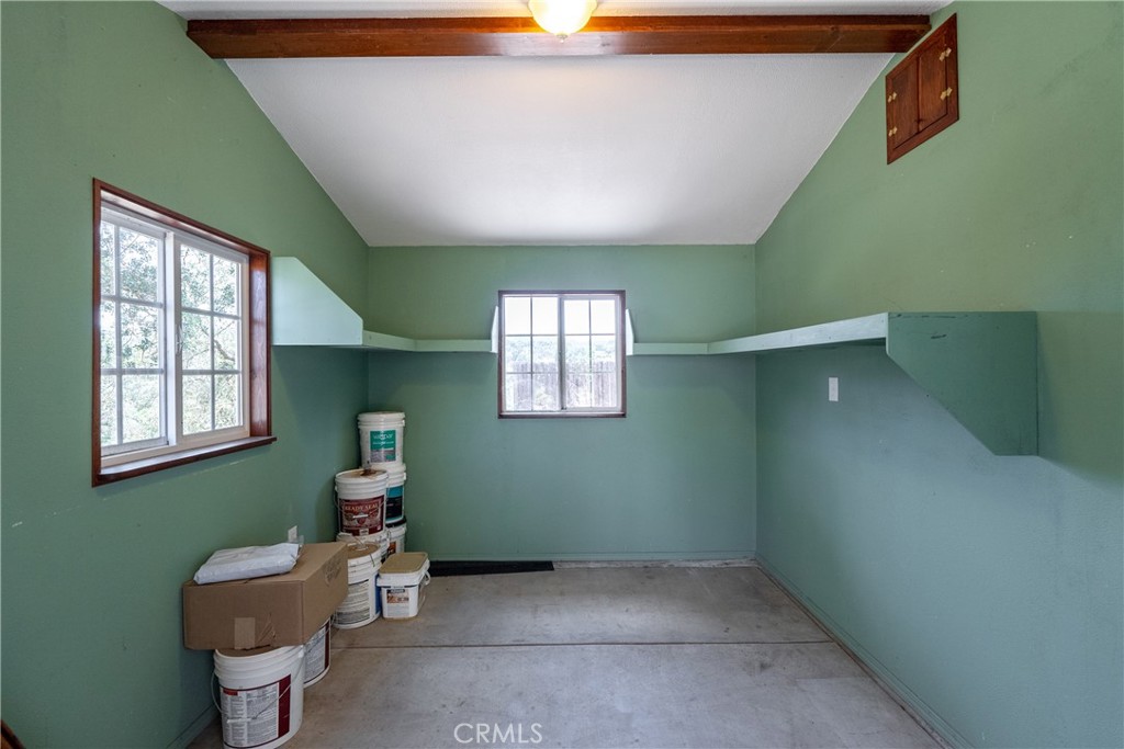 9340 Mountain View Drive Atascadero, CA 93422 - Photo 44 of 50 a bathroom with a toilet sink and window