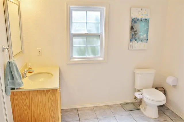 a view of a brick house with a large windows