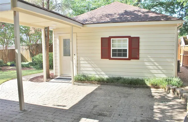 a backyard of a house with lots of green space