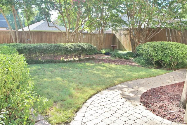 a view of a bathroom with a bathtub and shower