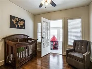 a bedroom with furniture and a window
