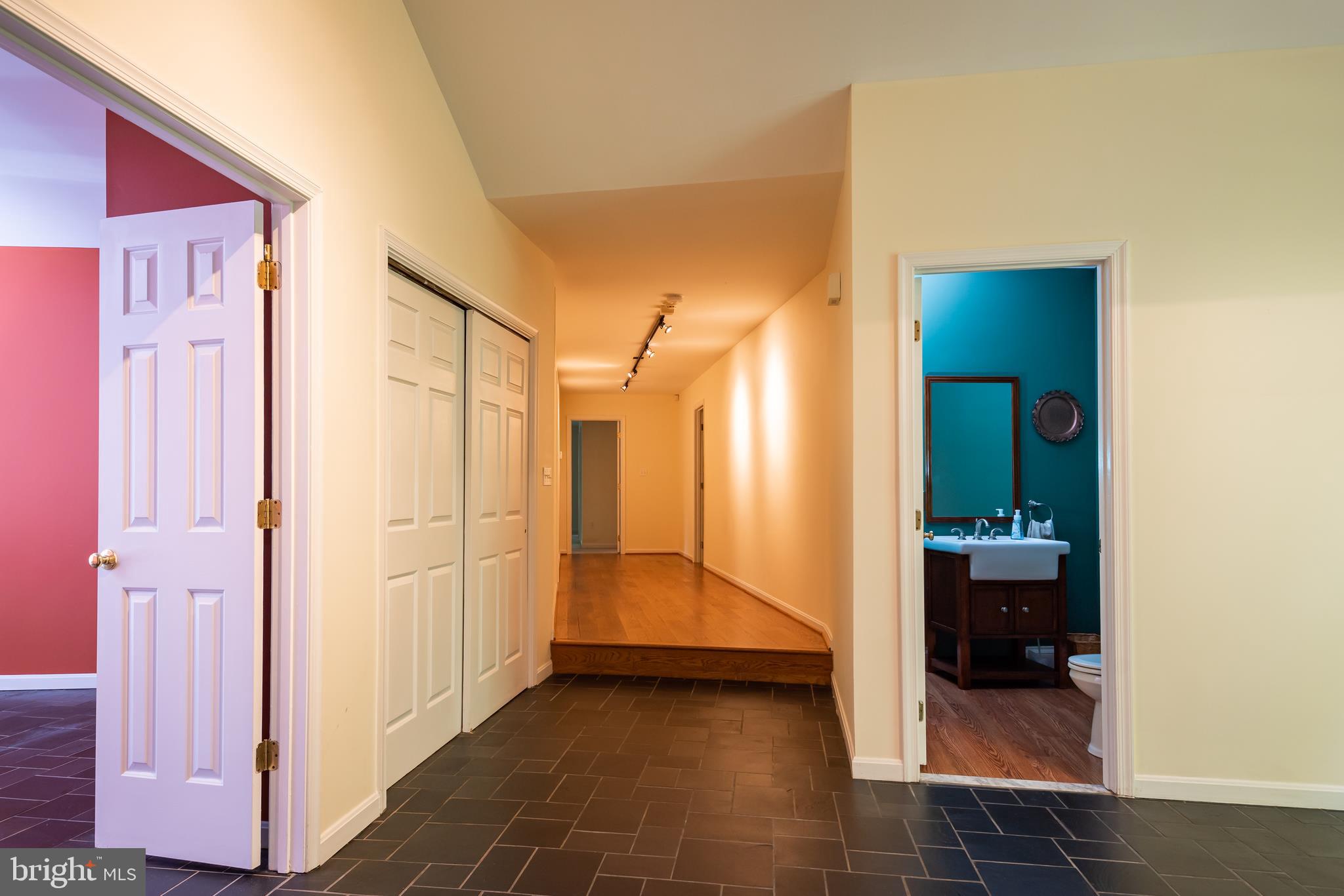 18254 Cherryfield Road Drayden, MD 20630 - Photo 11 of 34 hallway looking towards bedrooms from living area