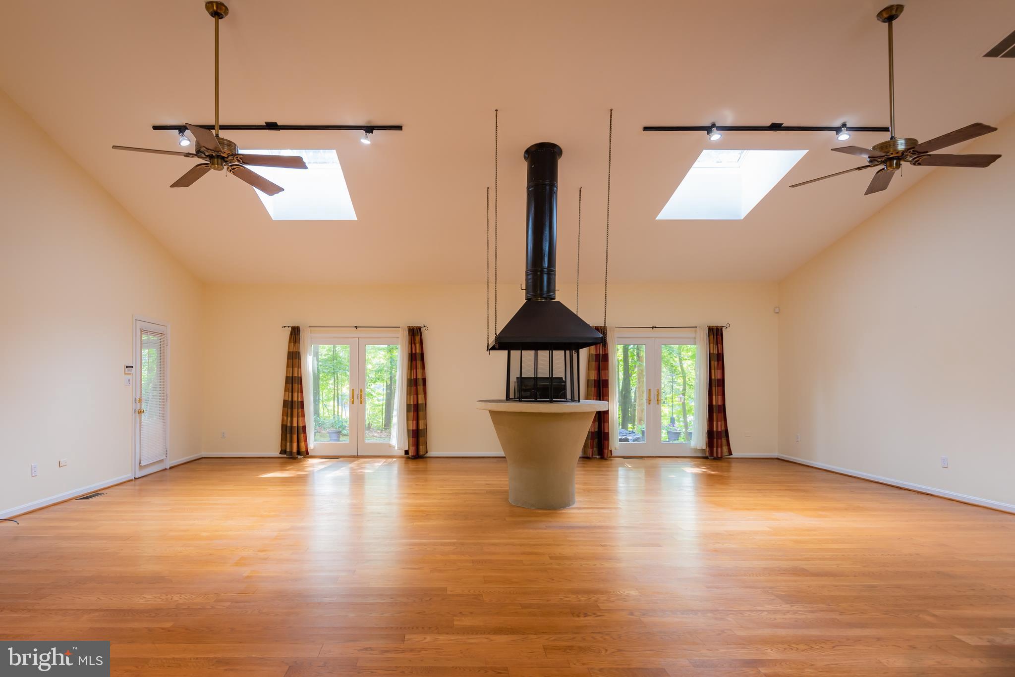 18254 Cherryfield Road Drayden, MD 20630 - Photo 27 of 34 great room opens to slate patio overlooking water
