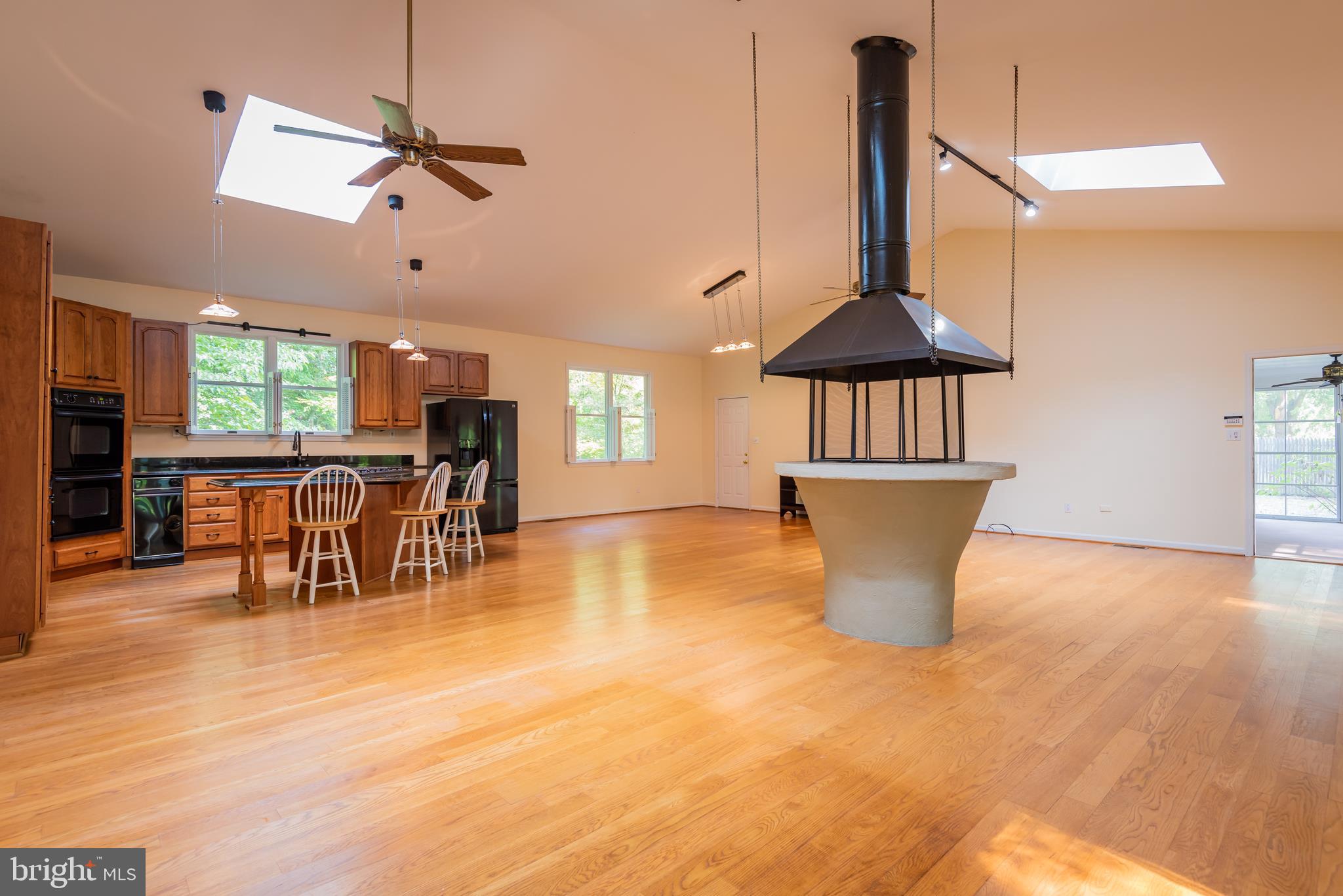 18254 Cherryfield Road Drayden, MD 20630 - Photo 32 of 34 fabulous open floorplan; fireplace & skylights