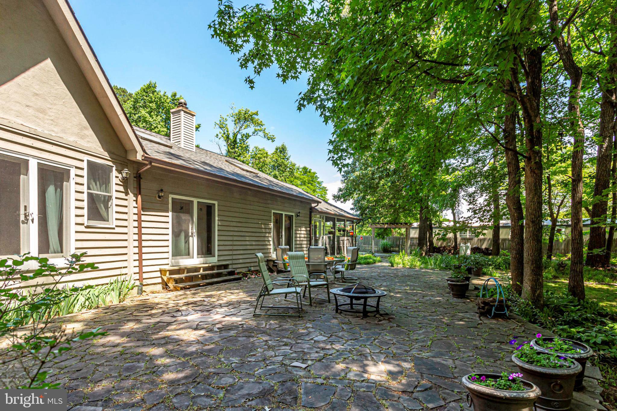 18254 Cherryfield Road Drayden, MD 20630 - Photo 5 of 34 beautiful slate patio on water side of home