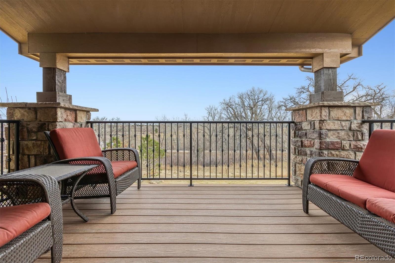 2065 Primo Road, Unit F Highlands Ranch, CO 80129 - Photo 24 of 37 a view of a balcony with furniture