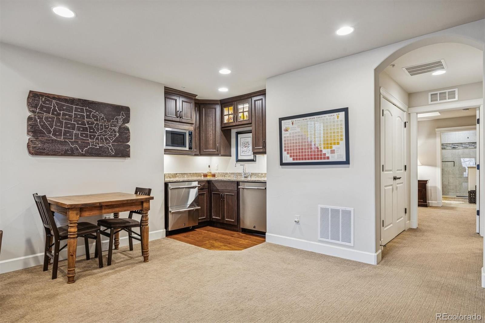 2065 Primo Road, Unit F Highlands Ranch, CO 80129 - Photo 28 of 37 a view of a livingroom with furniture and window