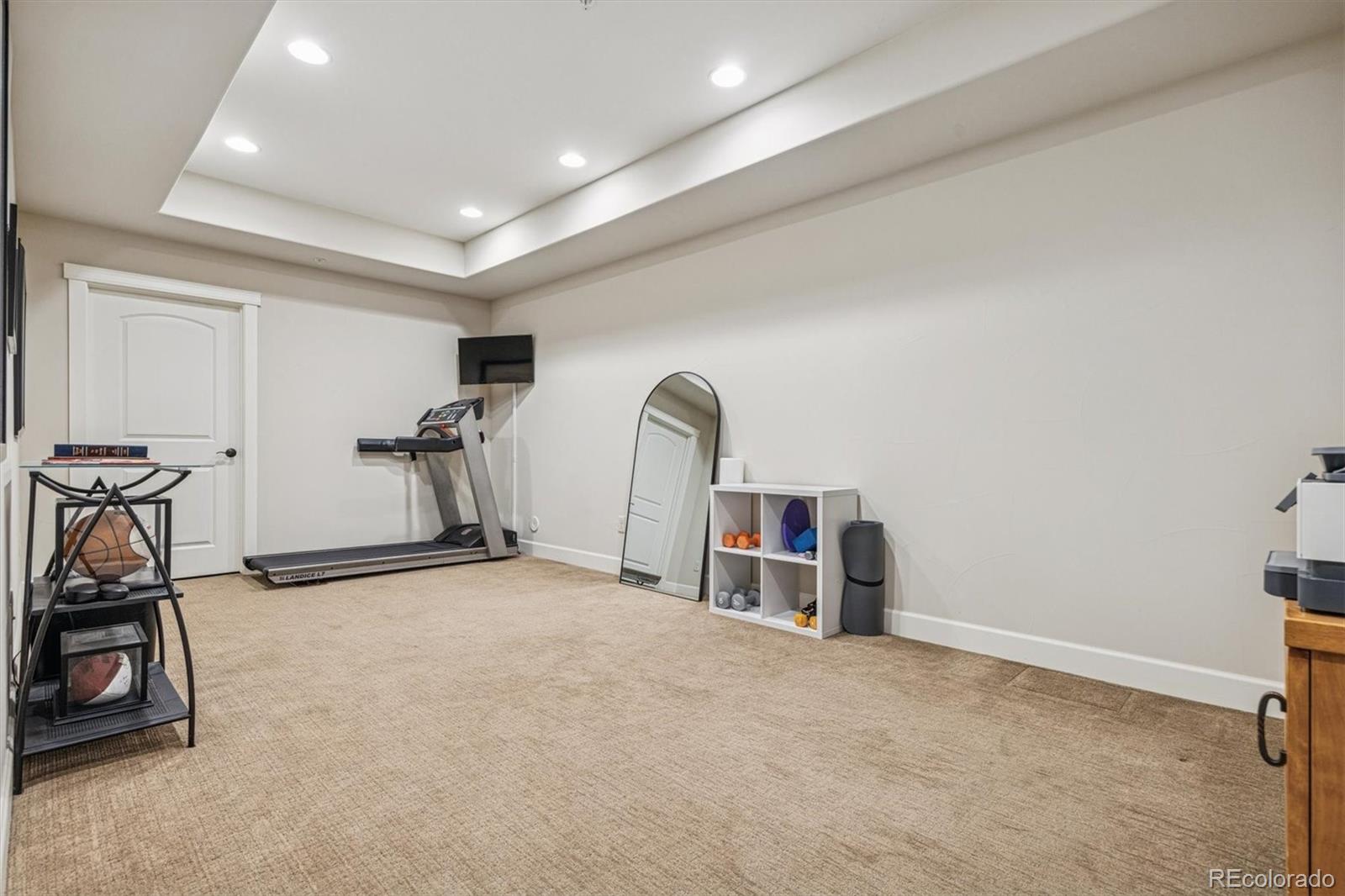 2065 Primo Road, Unit F Highlands Ranch, CO 80129 - Photo 34 of 37 a view of a room with gym equipment