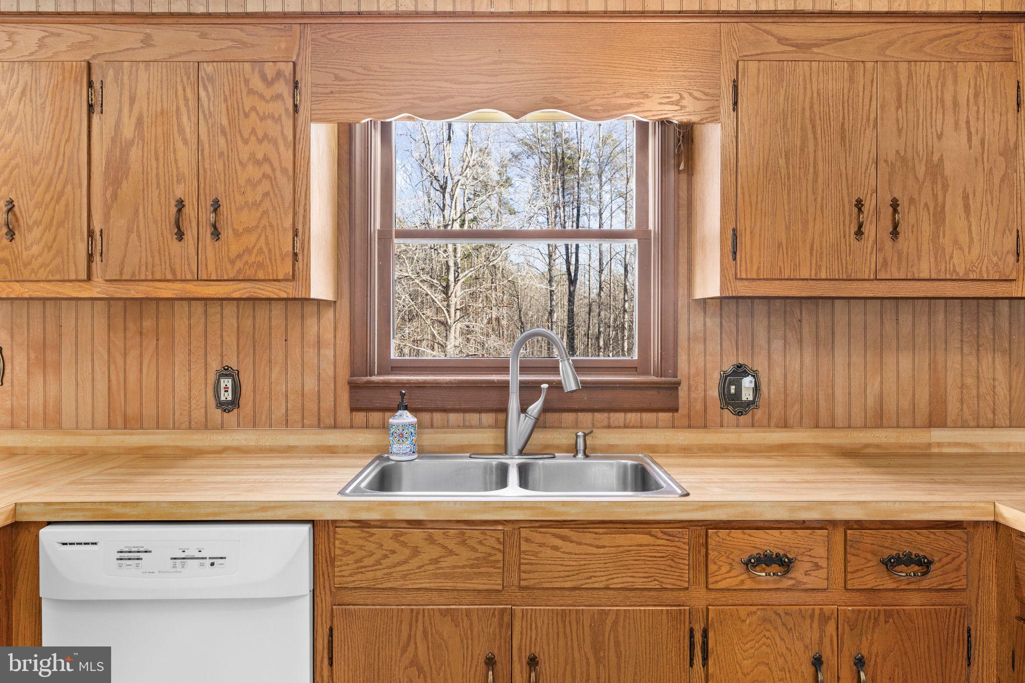 16125 Mountain Track Road Orange, VA 22960 - Photo 16 of 60 a kitchen with a sink cabinets and window