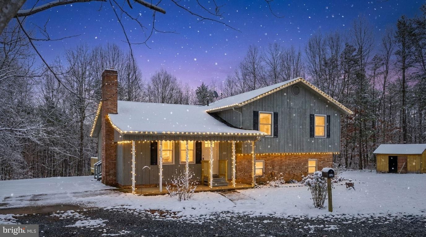 16125 Mountain Track Road Orange, VA 22960 - Photo 2 of 60 a front view of a house with garden
