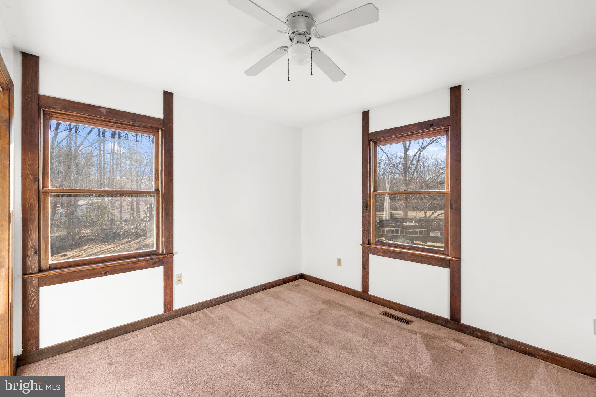 16125 Mountain Track Road Orange, VA 22960 - Photo 22 of 60 an empty room with windows and closet
