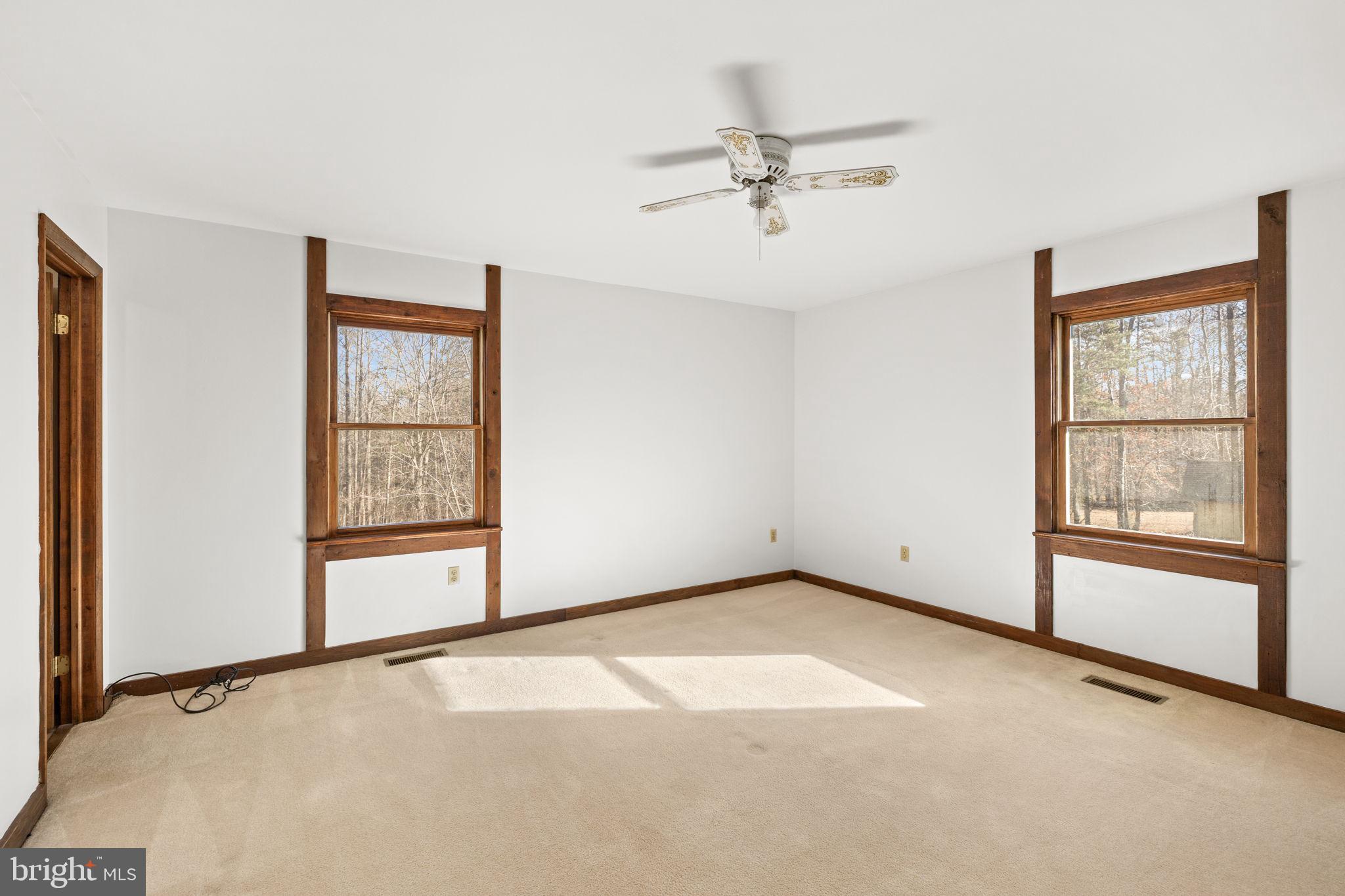 16125 Mountain Track Road Orange, VA 22960 - Photo 24 of 60 an empty room with windows and closet