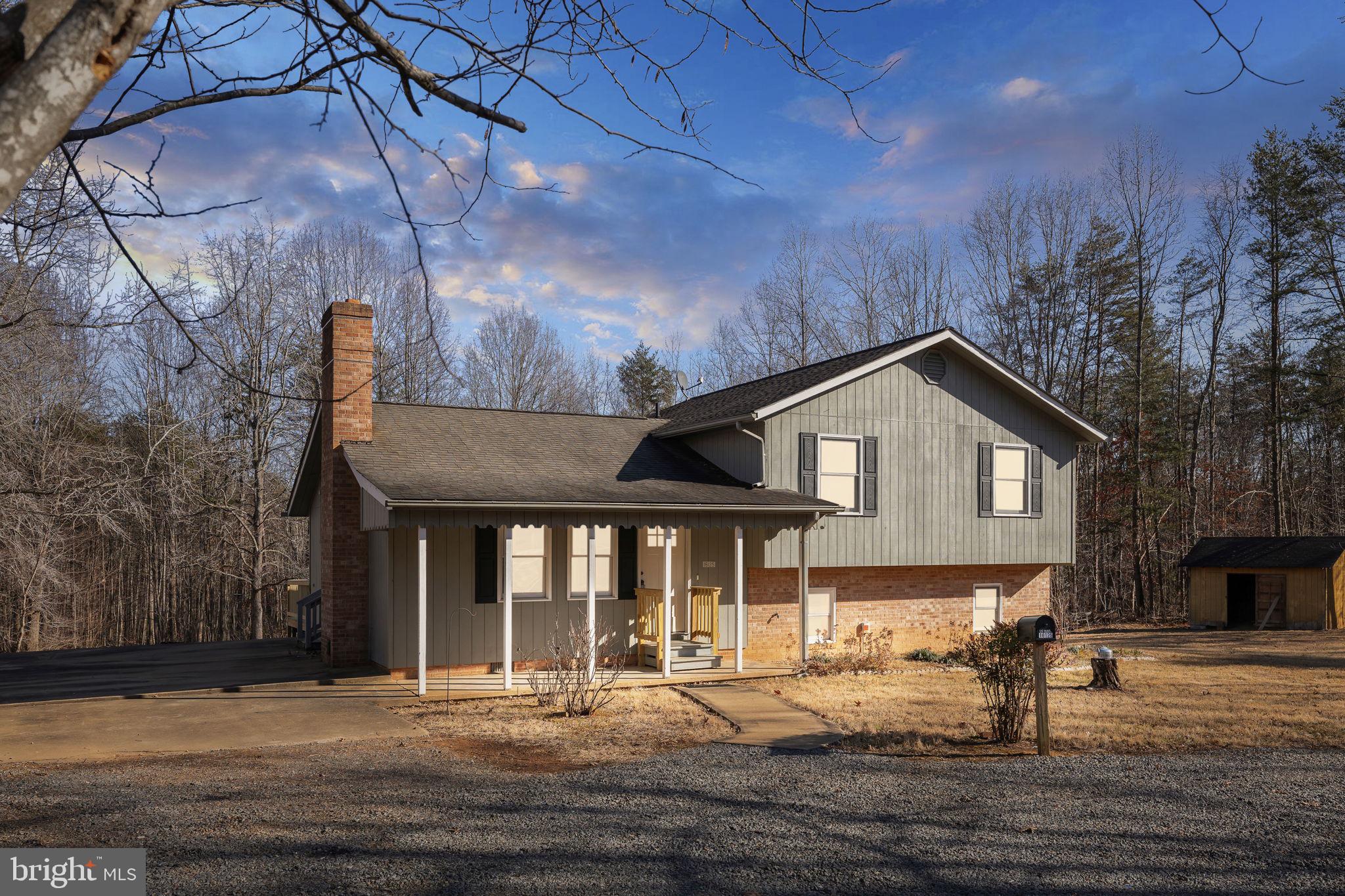 16125 Mountain Track Road Orange, VA 22960 - Photo 3 of 60 a front view of a house with a yard