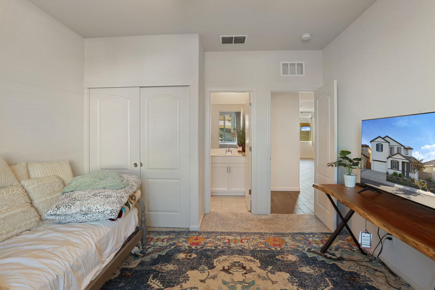 2004 Ravine Lane Manteca, CA 95337 - Photo 4 of 28 a living room with furniture and a rug