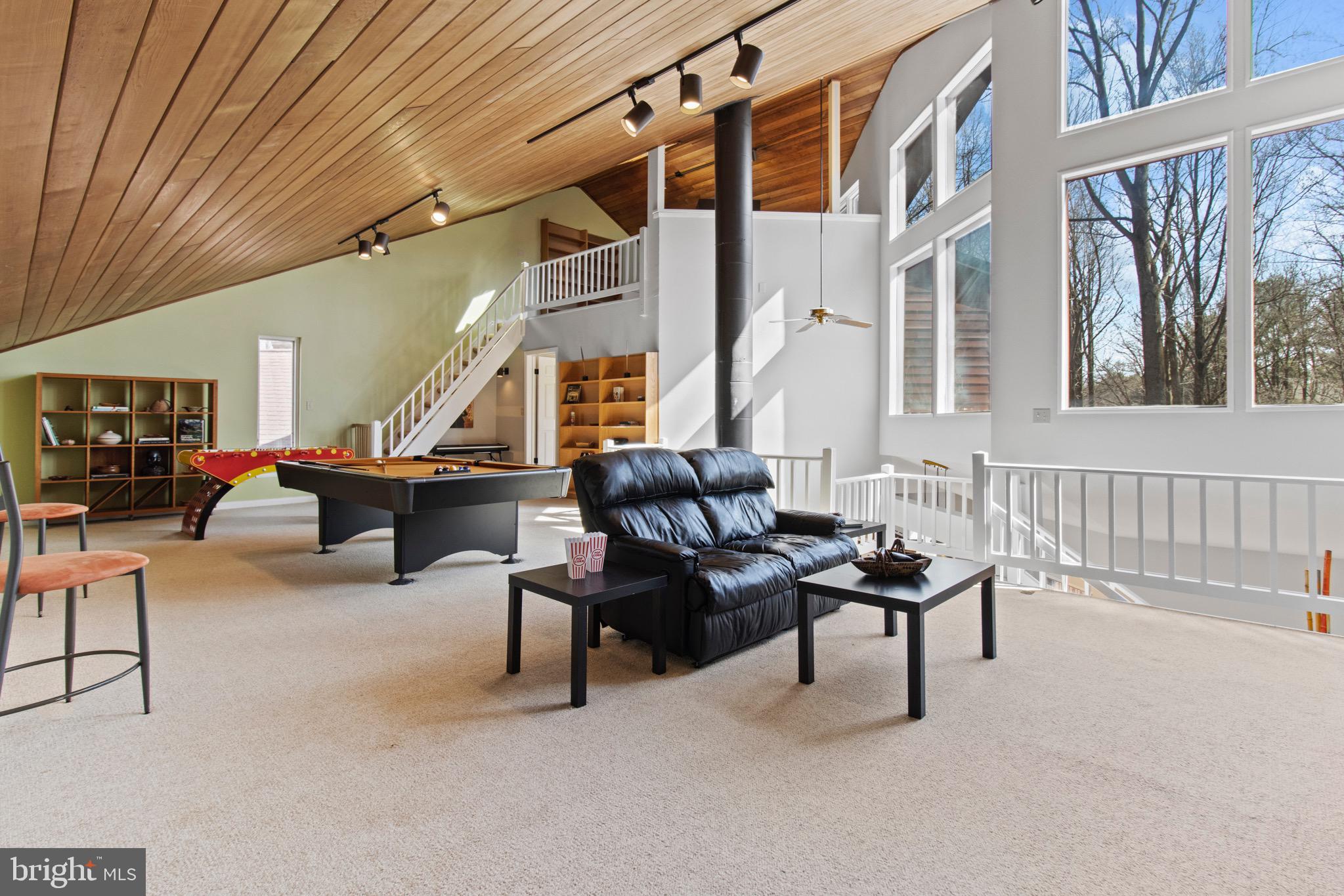 13700 Query Mill Road North Potomac, MD 20878 - Photo 39 of 96 3rdFloor Great Room w/ Open Ceiling to Family Room