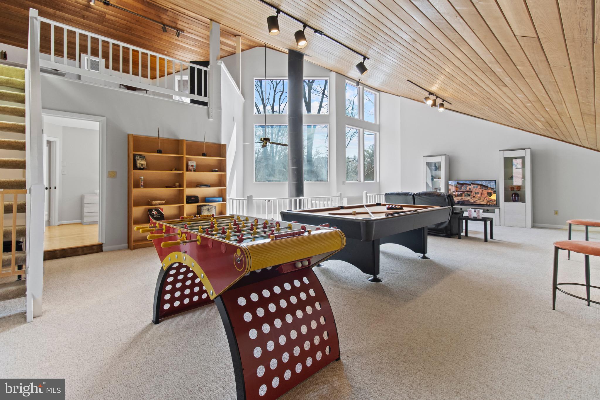 13700 Query Mill Road North Potomac, MD 20878 - Photo 42 of 96 Third Floor Great Room w/ Stairs to 4th Floor Loft