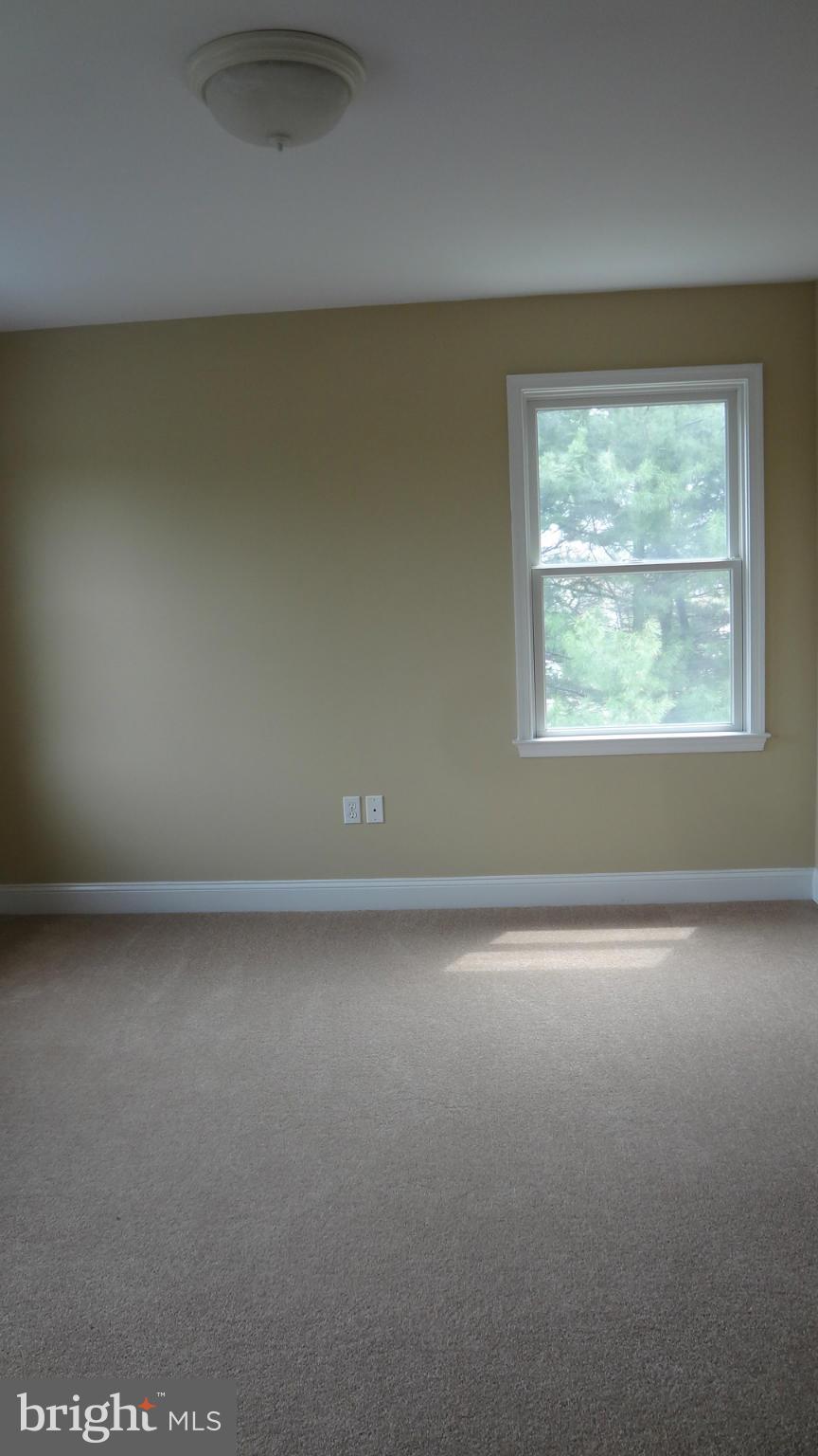 6800 Olney Laytonsville Road Laytonsville, MD 20882 - Photo 8 of 13 an empty room with a window