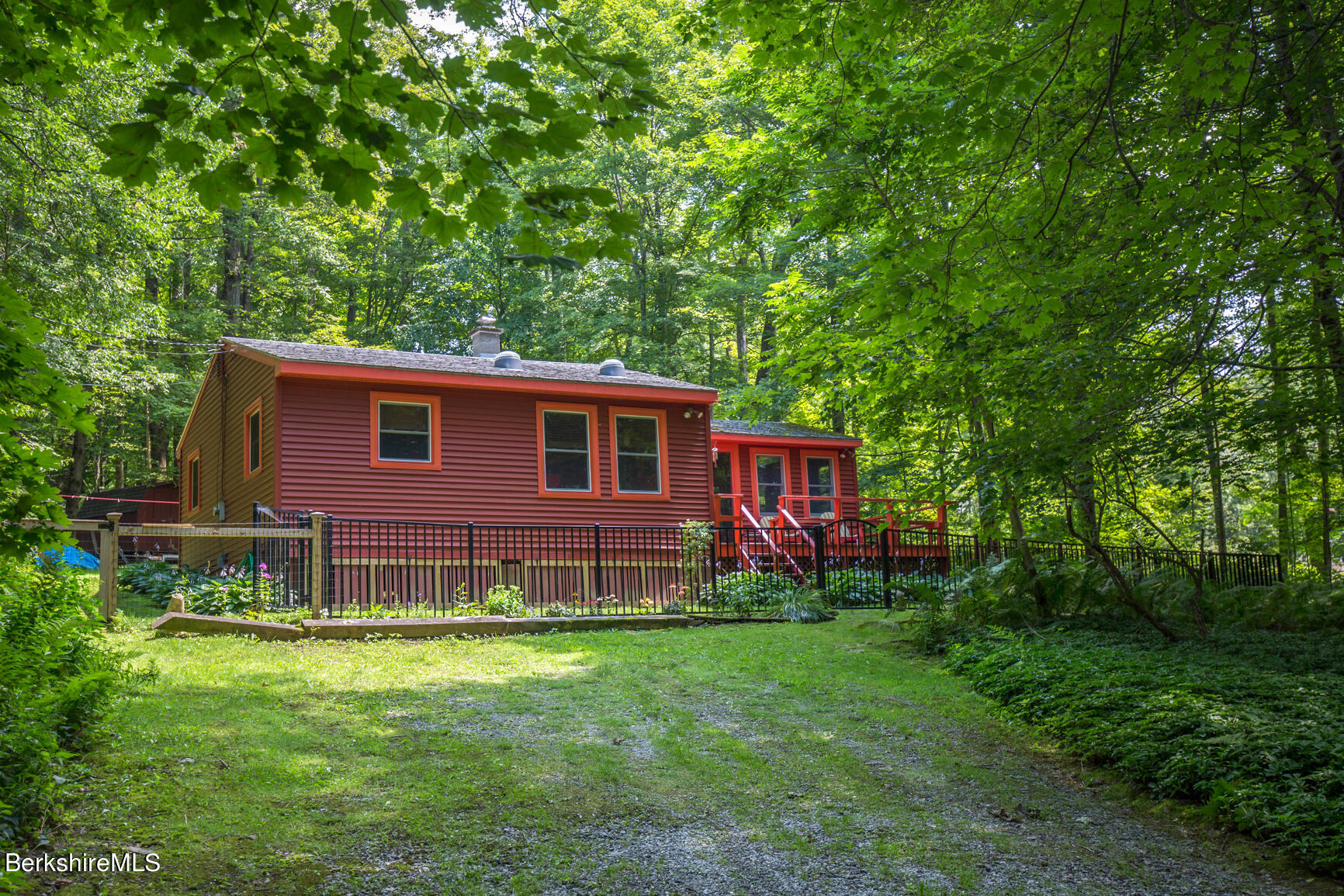 1 Massasoit Road Stockbridge, MA 01262 - Photo 1 of 28 a backyard of a house with lots of green space