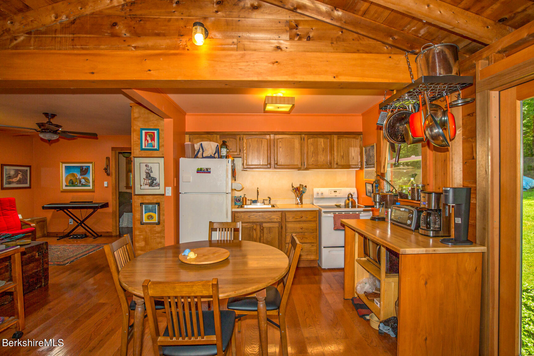 1 Massasoit Road Stockbridge, MA 01262 - Photo 12 of 28 a view of a dining room with furniture and wooden floor