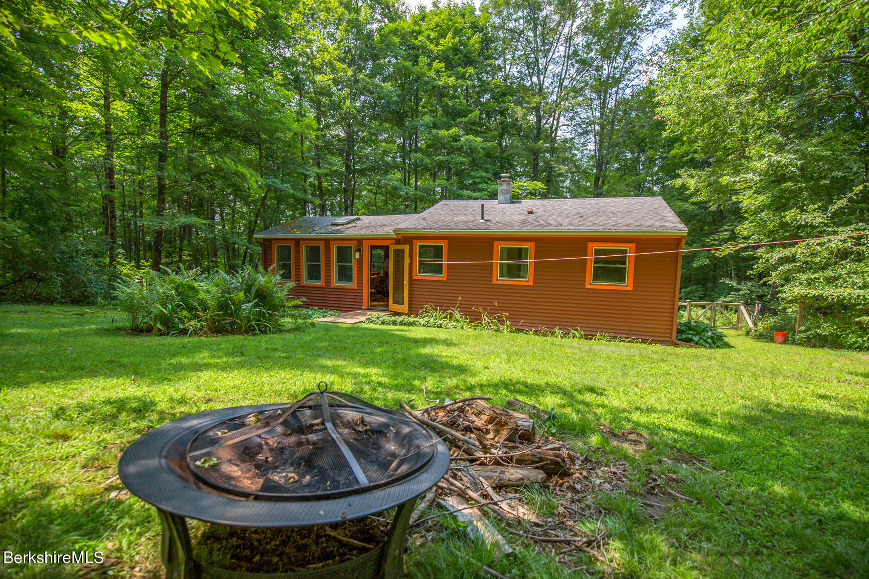 1 Massasoit Road Stockbridge, MA 01262 - Photo 19 of 28 a view of an house with backyard space and garden