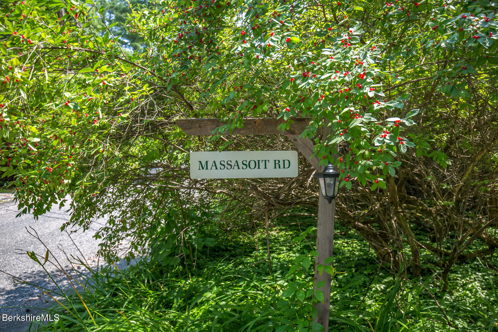 1 Massasoit Road Stockbridge, MA 01262 - Photo 28 of 28 a sign board with tall trees
