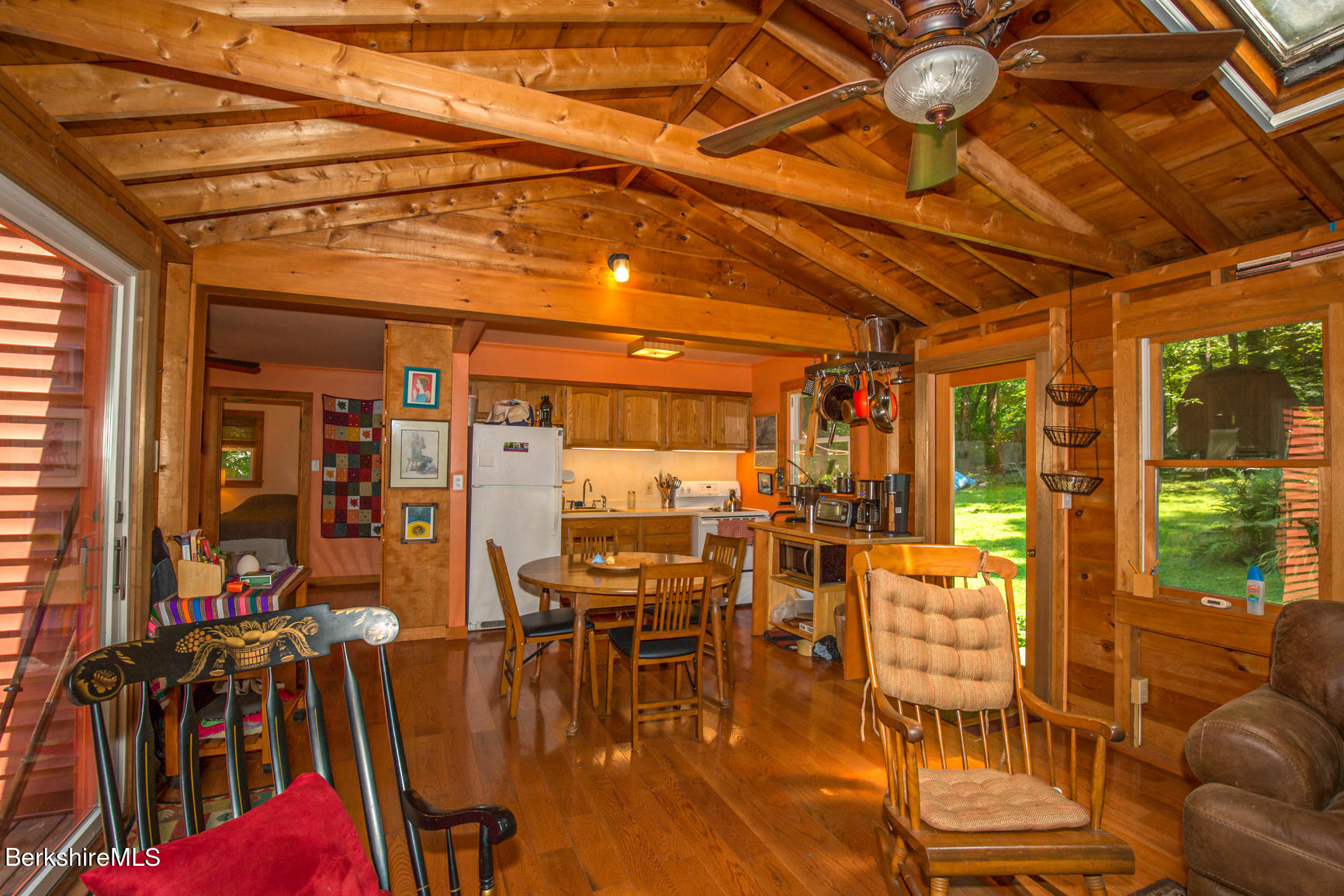 1 Massasoit Road Stockbridge, MA 01262 - Photo 10 of 28 a living room with lots of furniture and a black umbrella
