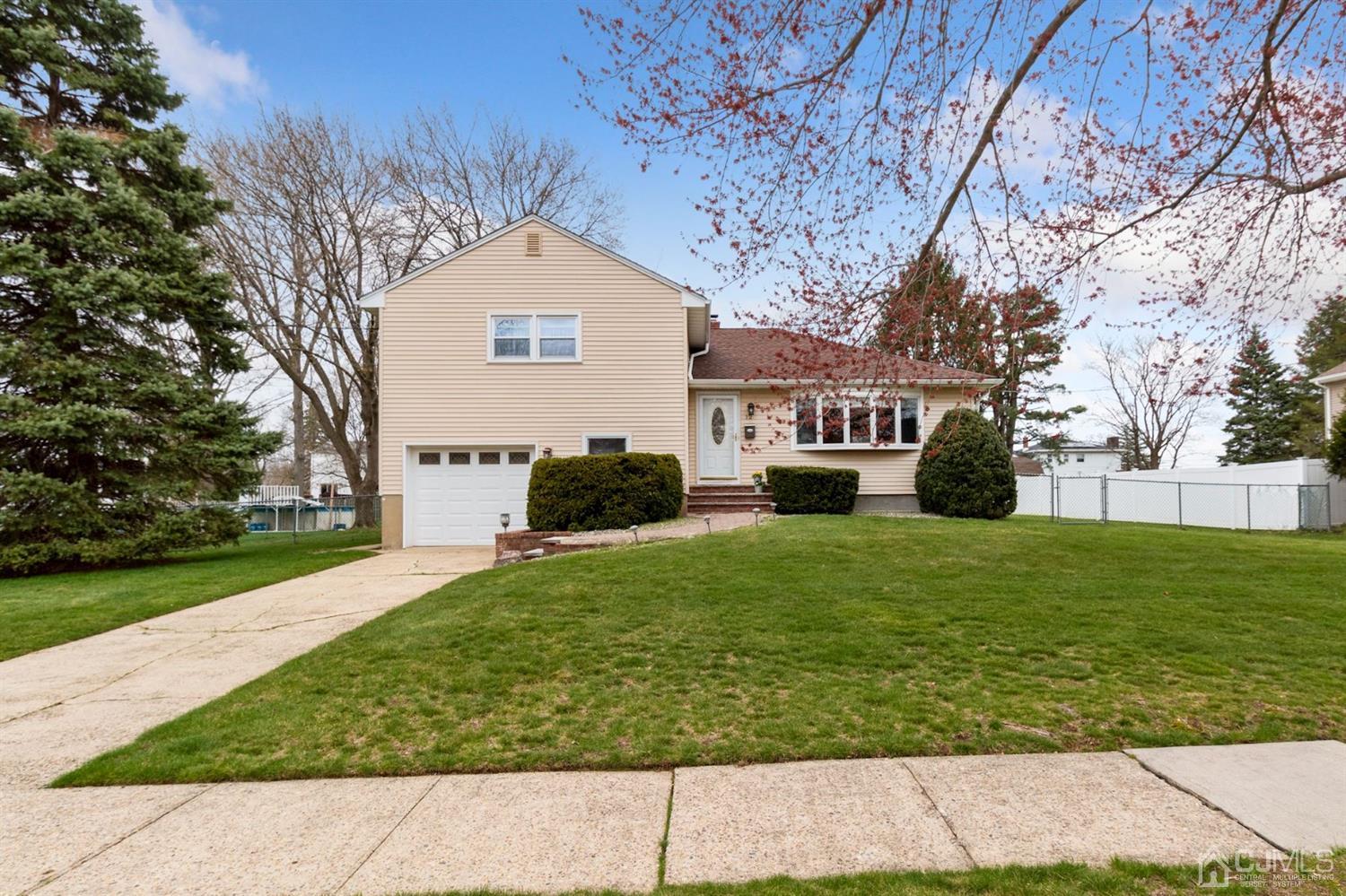 12 Hudson Road East Brunswick, NJ 08816 - Photo 2 of 30 a view of a house with a yard