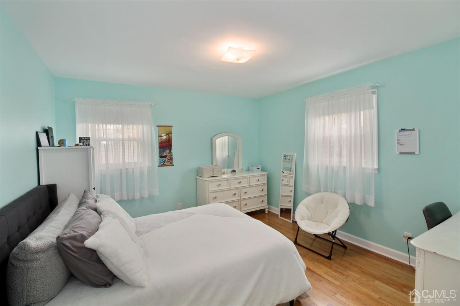 12 Hudson Road East Brunswick, NJ 08816 - Photo 13 of 30 a bedroom with a bed and dresser