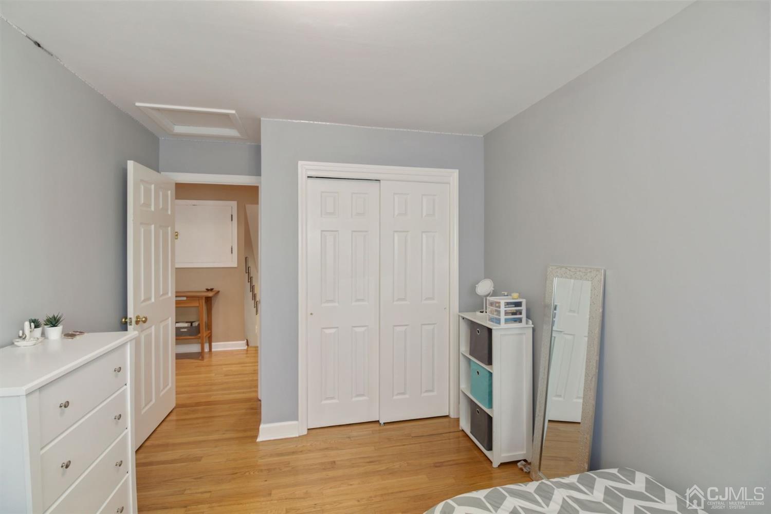 12 Hudson Road East Brunswick, NJ 08816 - Photo 16 of 30 a bathroom with a sink a mirror and a bathtub