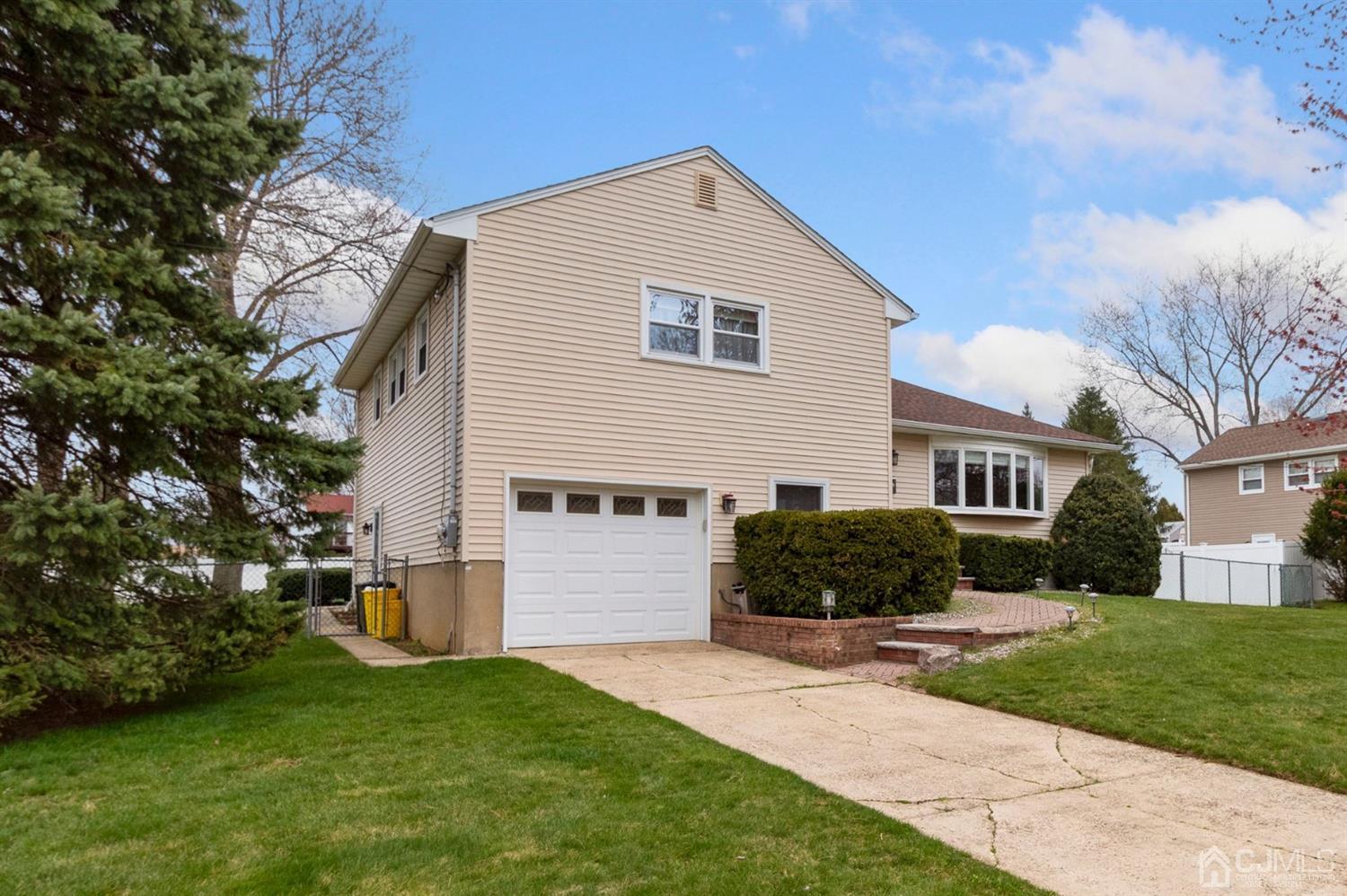 12 Hudson Road East Brunswick, NJ 08816 - Photo 3 of 30 a view of a house with a yard