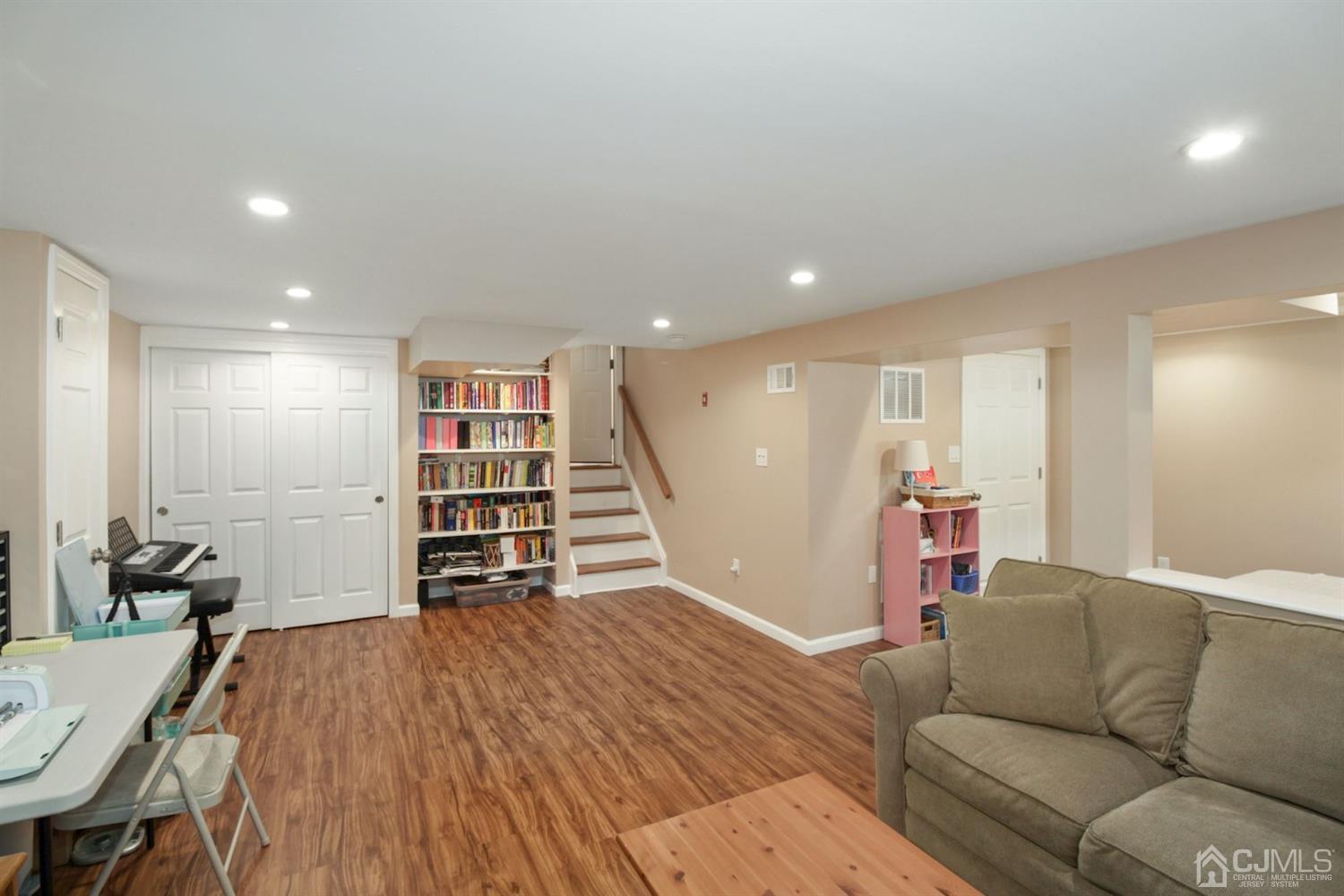 12 Hudson Road East Brunswick, NJ 08816 - Photo 24 of 30 a living room with furniture and wooden floor