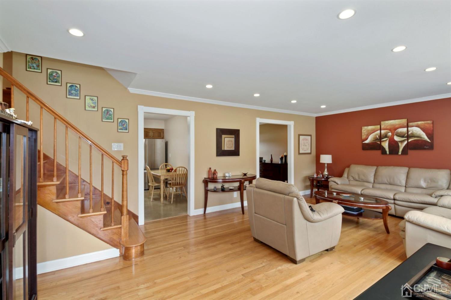 12 Hudson Road East Brunswick, NJ 08816 - Photo 4 of 30 a living room with furniture and wooden floor