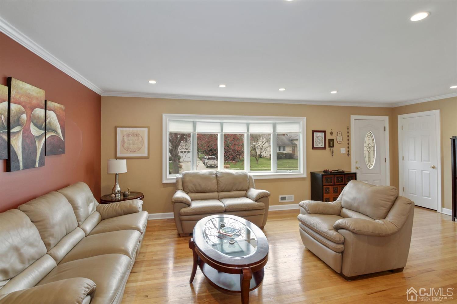 12 Hudson Road East Brunswick, NJ 08816 - Photo 5 of 30 a living room with furniture and a large window
