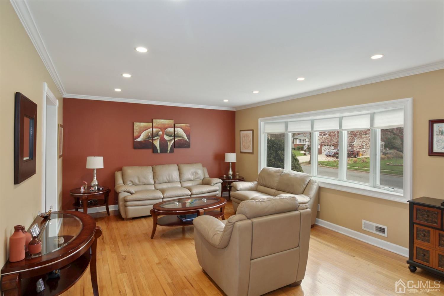 12 Hudson Road East Brunswick, NJ 08816 - Photo 6 of 30 a living room with furniture and a flat screen tv