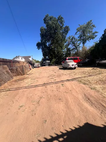 a view of a car parked on the side of the road