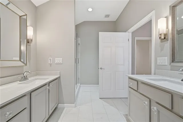 a view of cabinets and wooden floor