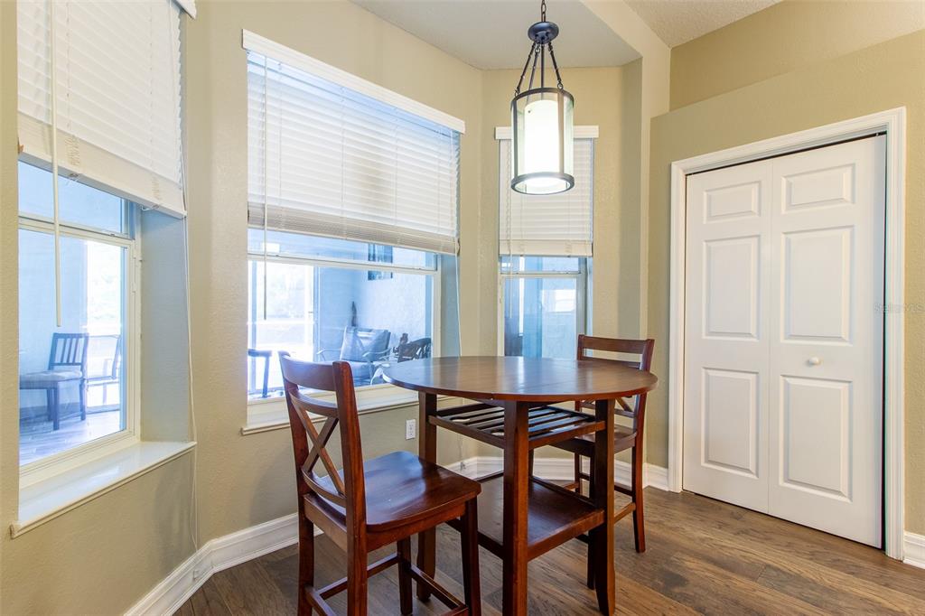 8950 Southeast 17th Court Ocala, FL 34480 - Photo 12 of 61 a dining room with furniture and window